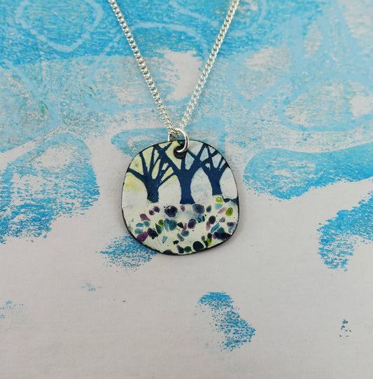 Hand-painted Three Tree Pendant necklace

Nature inspired copper disc pendant on silver-plated chain