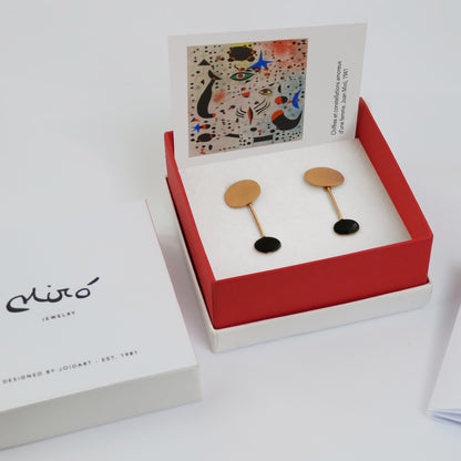 Golden Earrings and Black Miró Jewelry