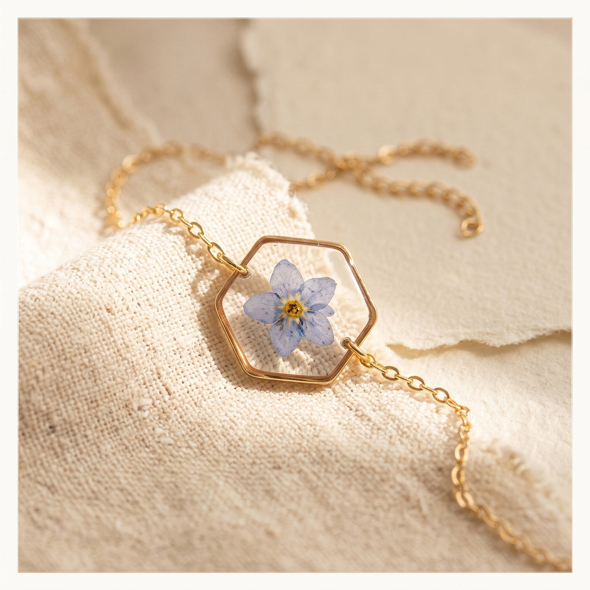 Axiom in Blue Hexagon Forget-Me-Not Bracelet - Gold – 24K Gold-plated brass chain, bezel and findings… – Atelier Modernista